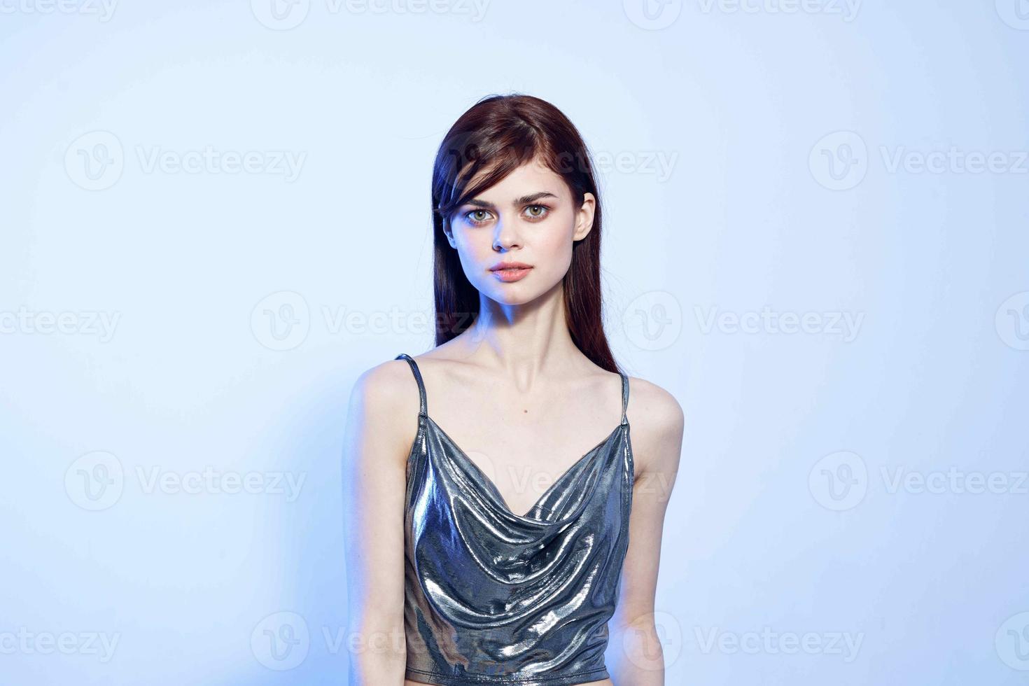 fashionable woman in silvery little posing model party photo