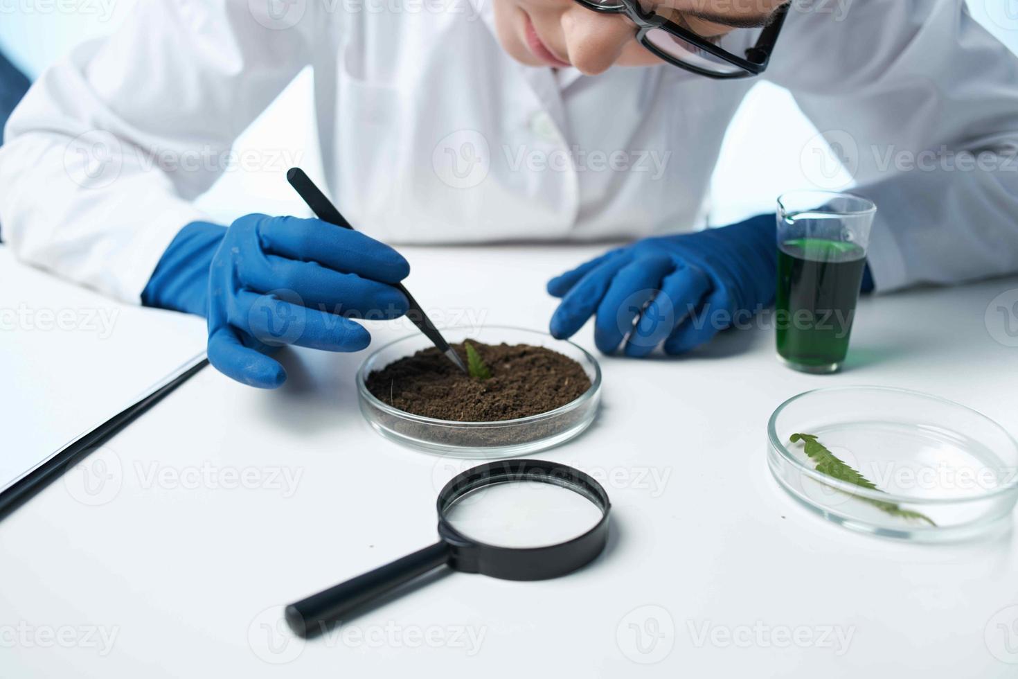 woman scientist biologist laboratory research plants photo