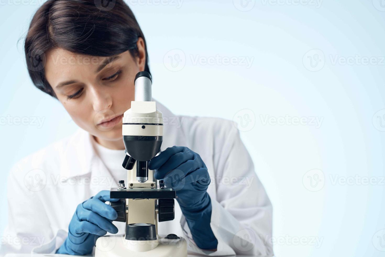 woman laboratory assistant microscope science technology professional research photo
