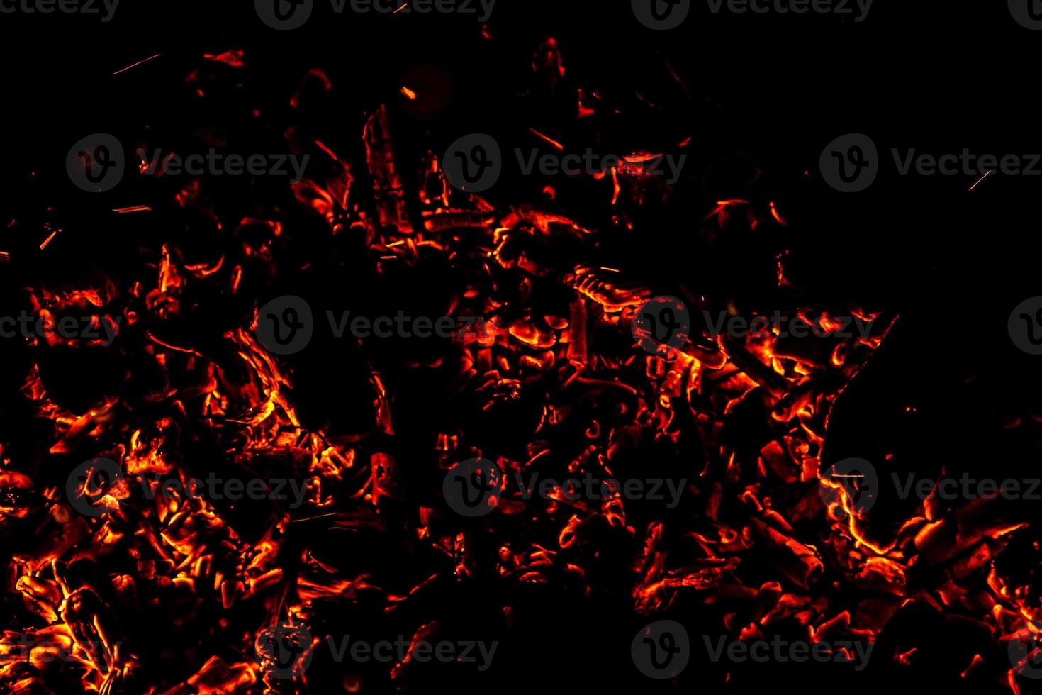 Fire flame texture. Burning material backdrop. Burn effect pattern. Blaze and torch wallpaper. Heat and haze backdrop. photo