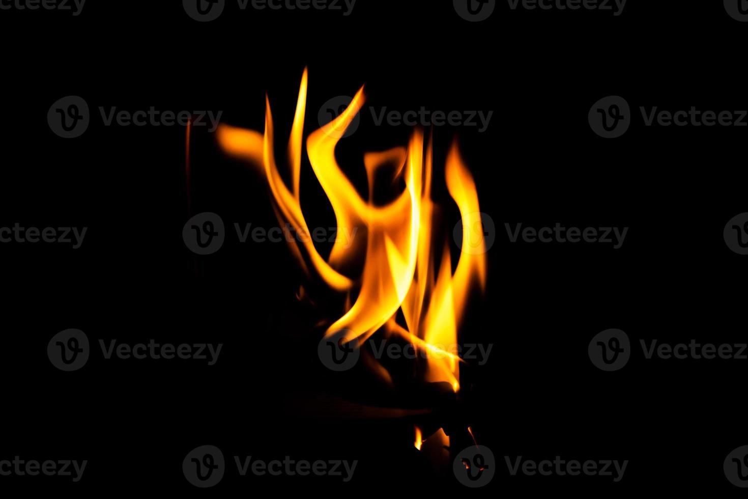 Fire flame texture. Burning material backdrop. Burn effect pattern. Blaze and torch wallpaper. Heat and haze backdrop. photo