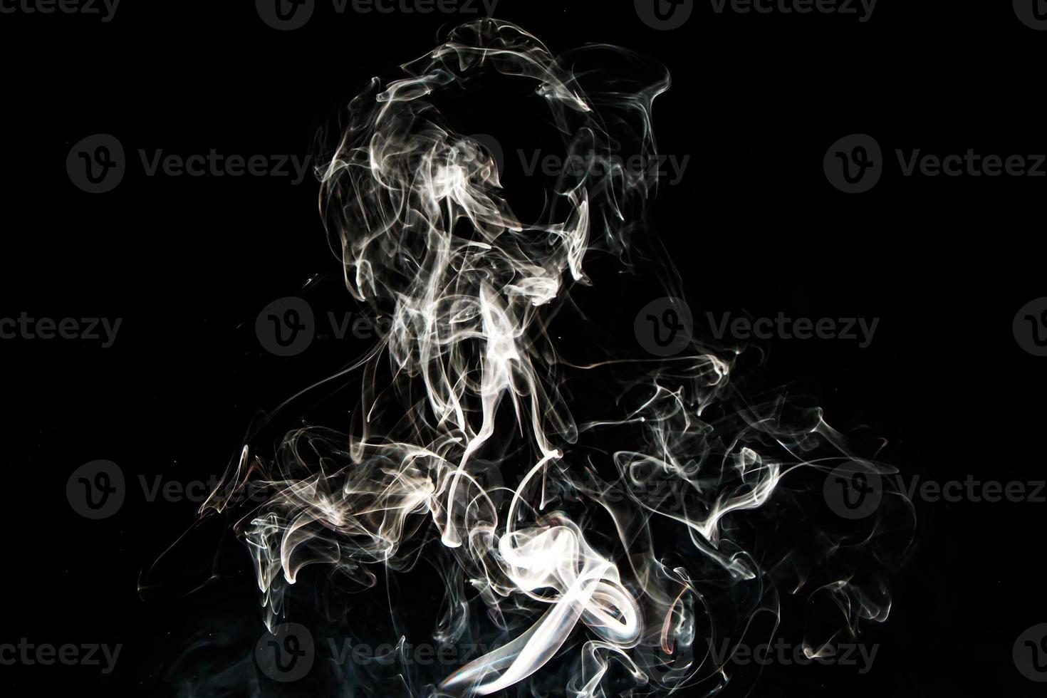 Smoke effect texture. Isolated background. Black and dark backdrop. Smokey fire and mistic effect. photo