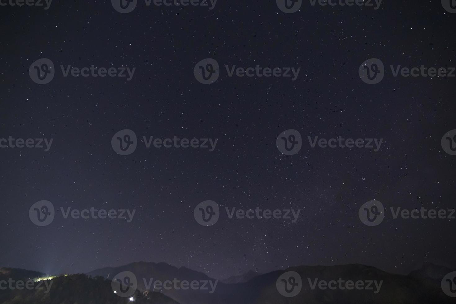 night sky above Himalayas mountains in Dharamshala, India photo