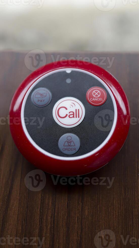 Wireless restaurant pager caregiver pager wireless nurse call system. Button transmitter calling system. photo