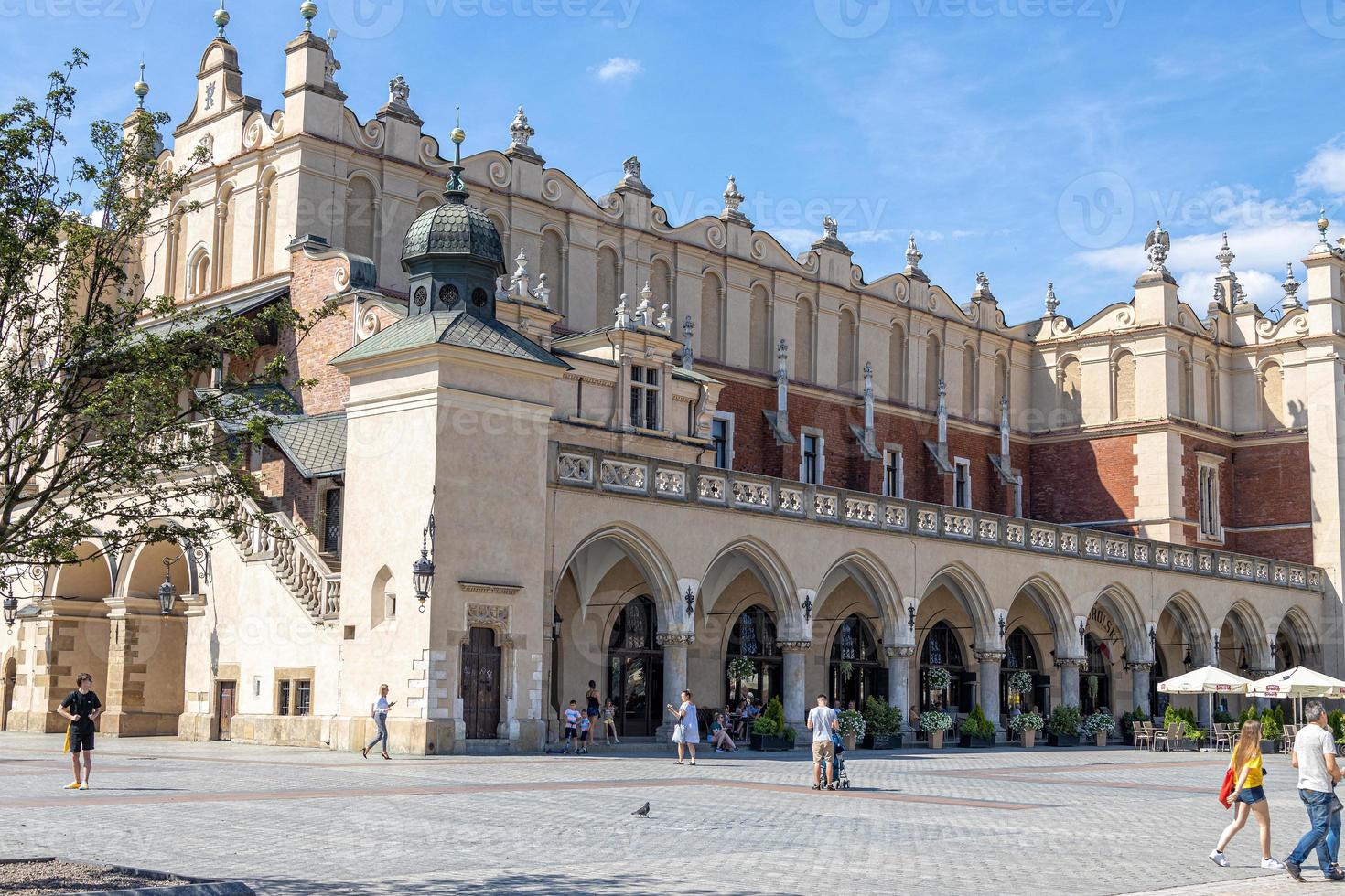 historic old town square in Krakow on a warm summer holiday day photo