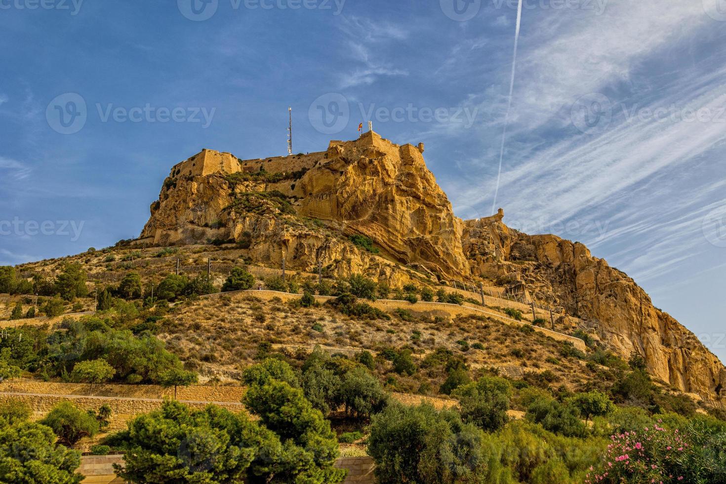 castle of saint barbara in alicante spain against blue sky landmark photo