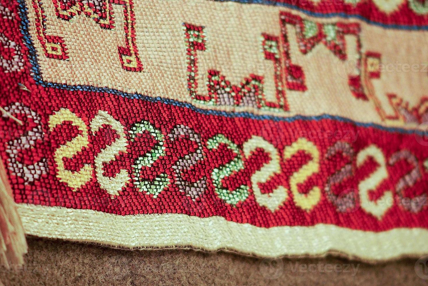 interesting background with handmade Turkish rugs in close-up photo