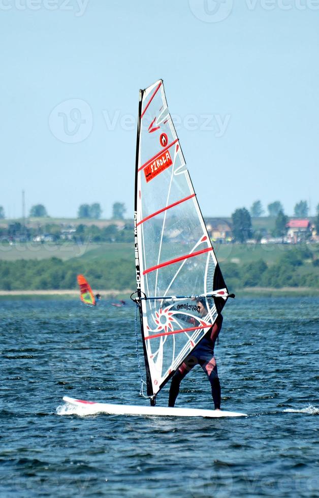 windsurfing on the bay of pucka on the baltic sea photo