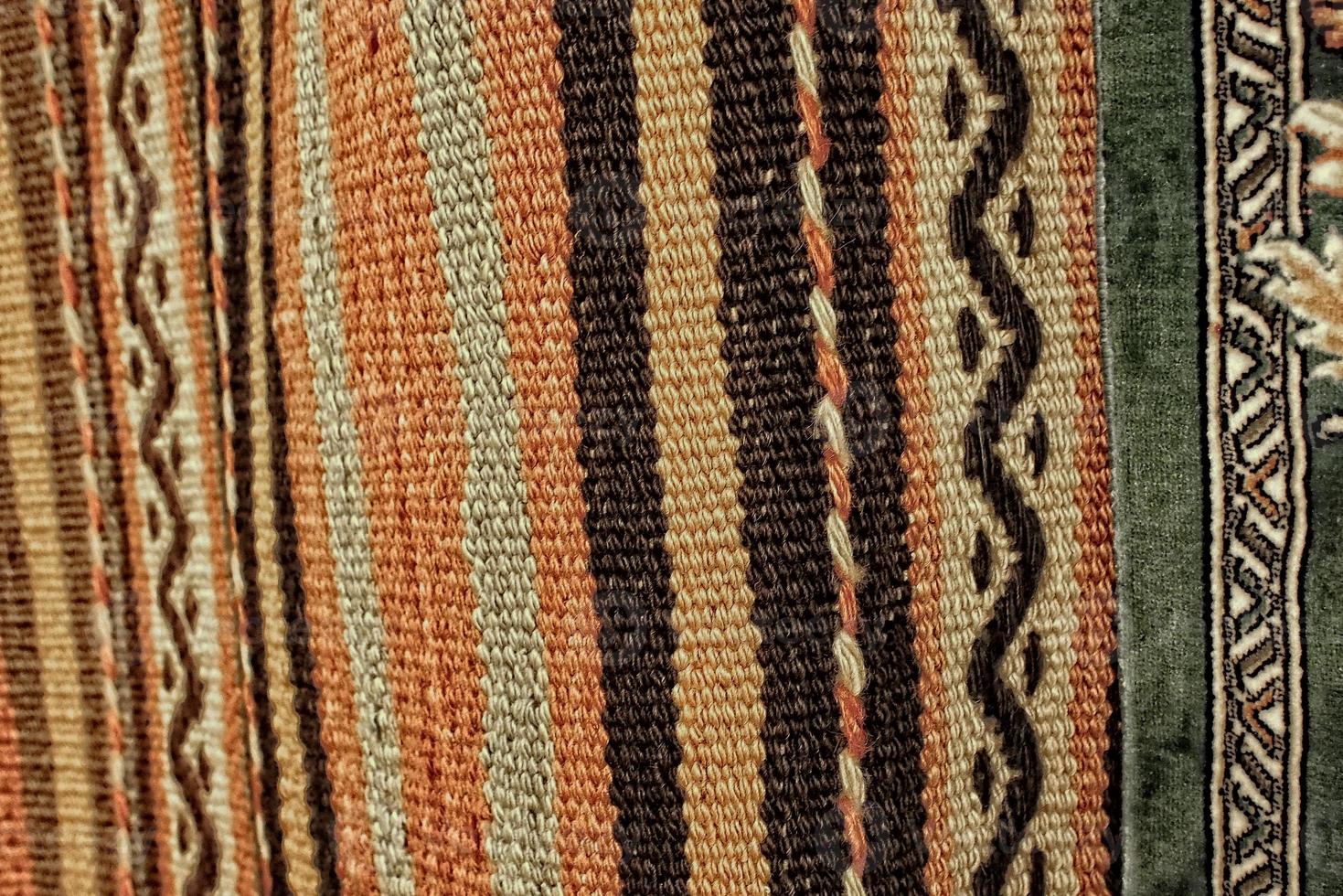 interesting background with handmade Turkish rugs in close-up photo