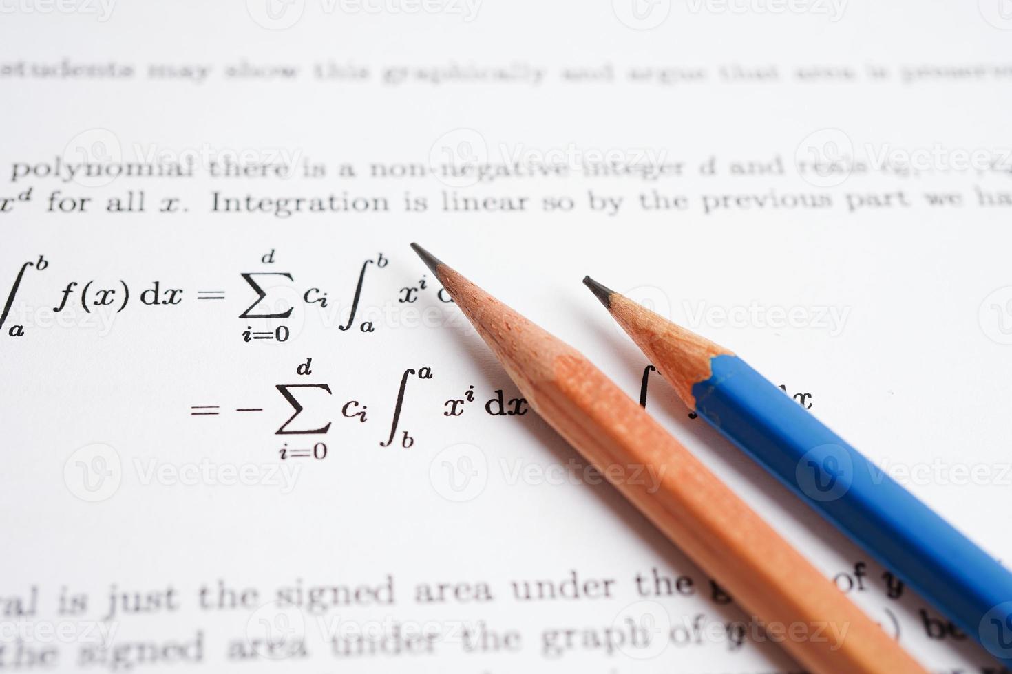 Pencil on mathematic formula exercise test paper in education school. photo