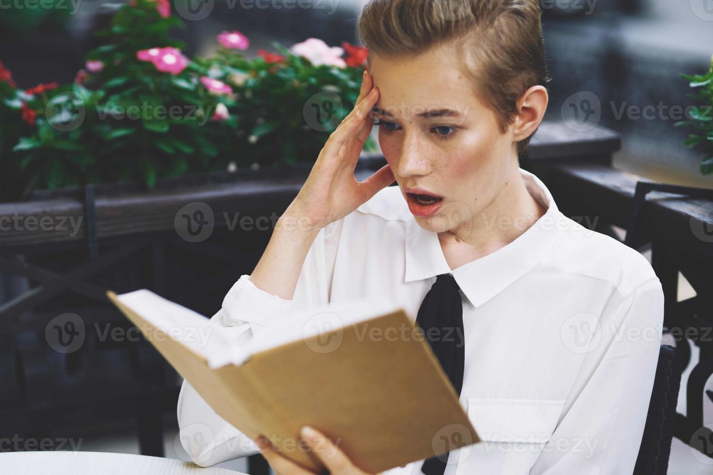 short haired woman outdoors rest fun walking around town education photo