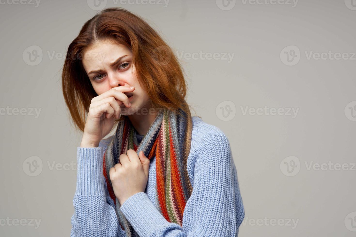 red-haired woman neck scarf cold handkerchief isolated background photo
