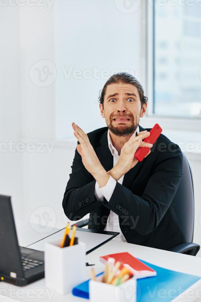 manager at the desk documents technology photo