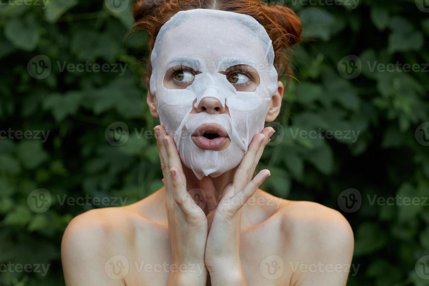 Portrait of a girl face mask Touch your face with your hands clear skin photo