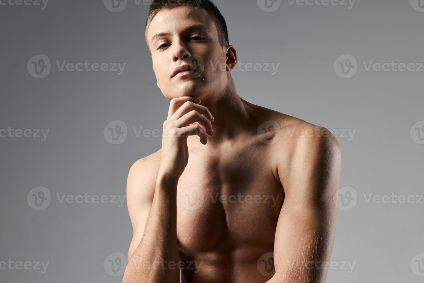 strong athlete with bulging arm muscles naked back gray background 22392017  Stock Photo at Vecteezy