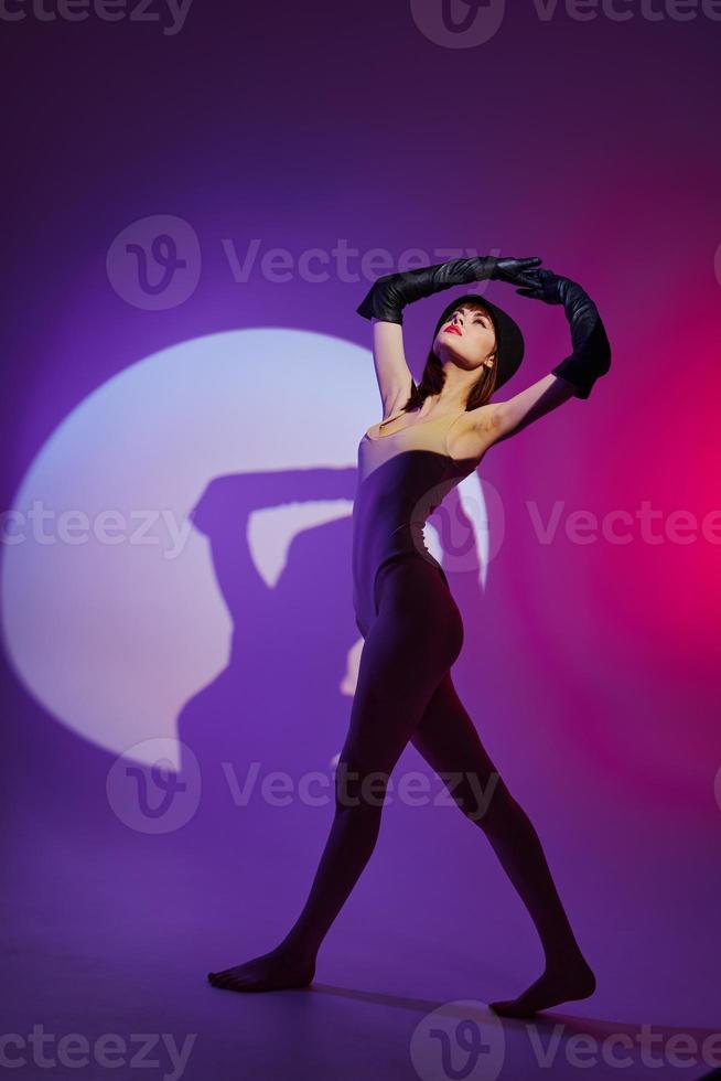 Portrait of a charming lady scene spotlight posing neon color background unaltered photo