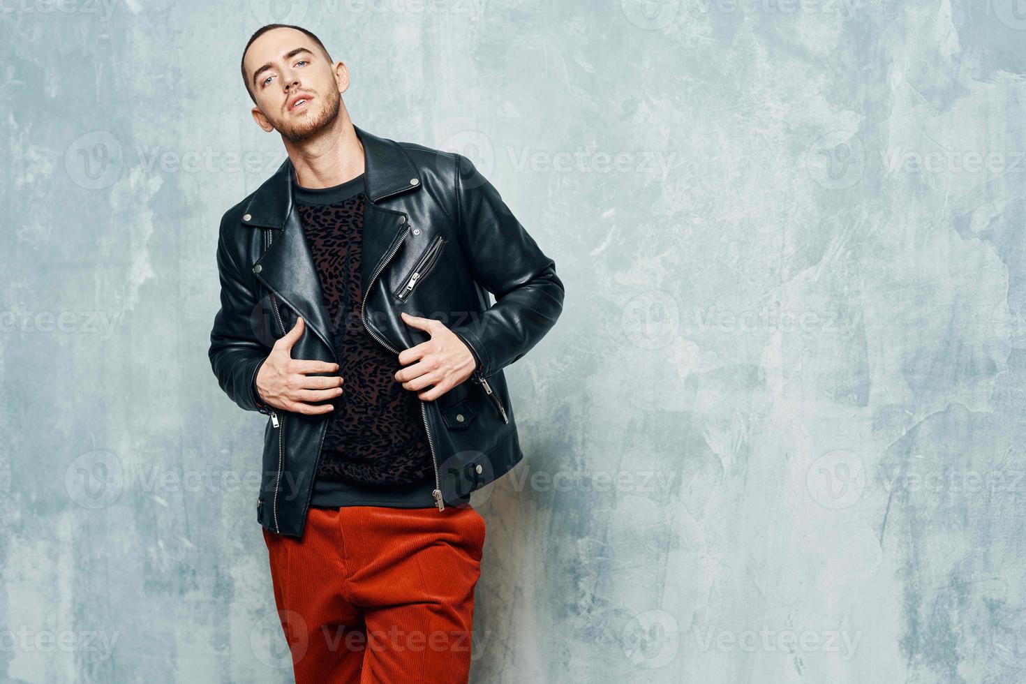 handsome man wearing black sweater fashion confidence posing light background photo