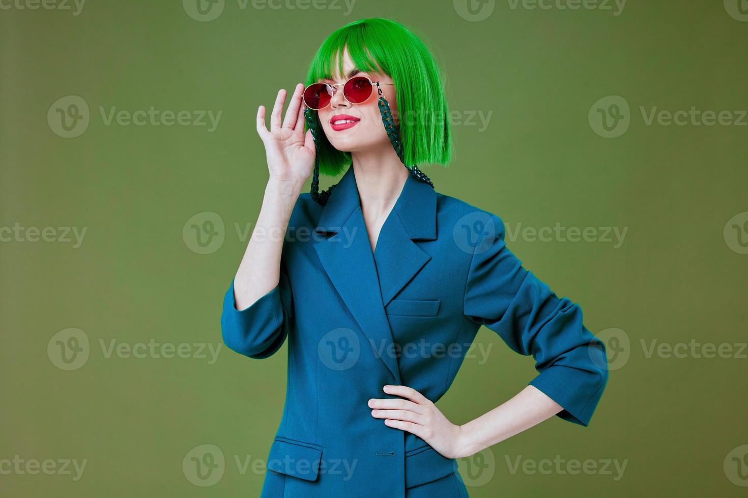 pretty woman green hair blue jacket sunglasses photo