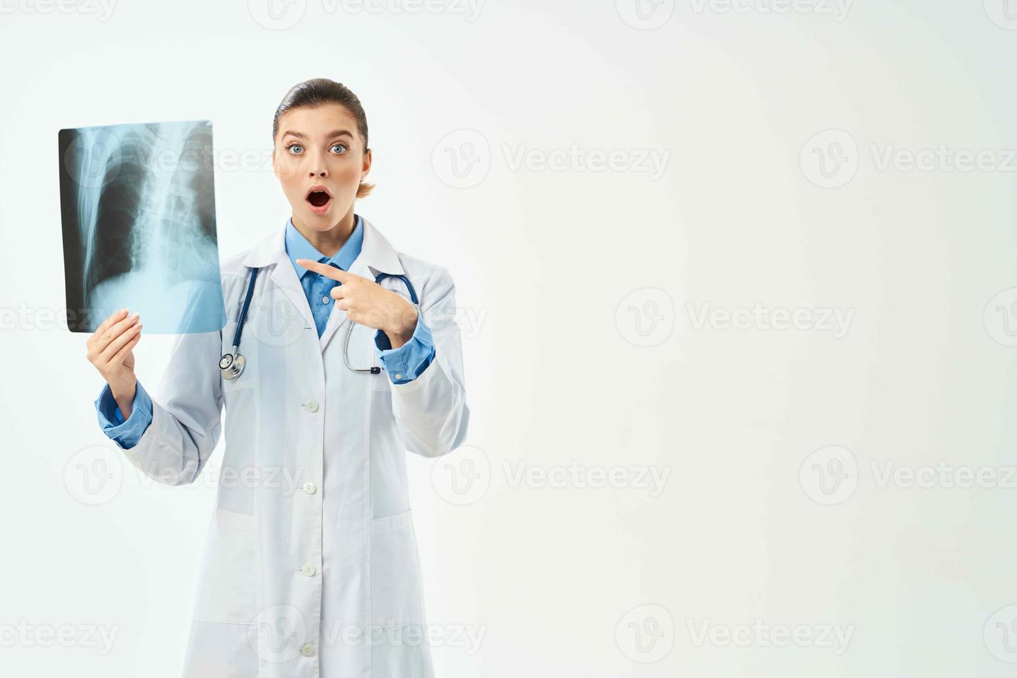 emotional radiologist x-ray hospital light background photo