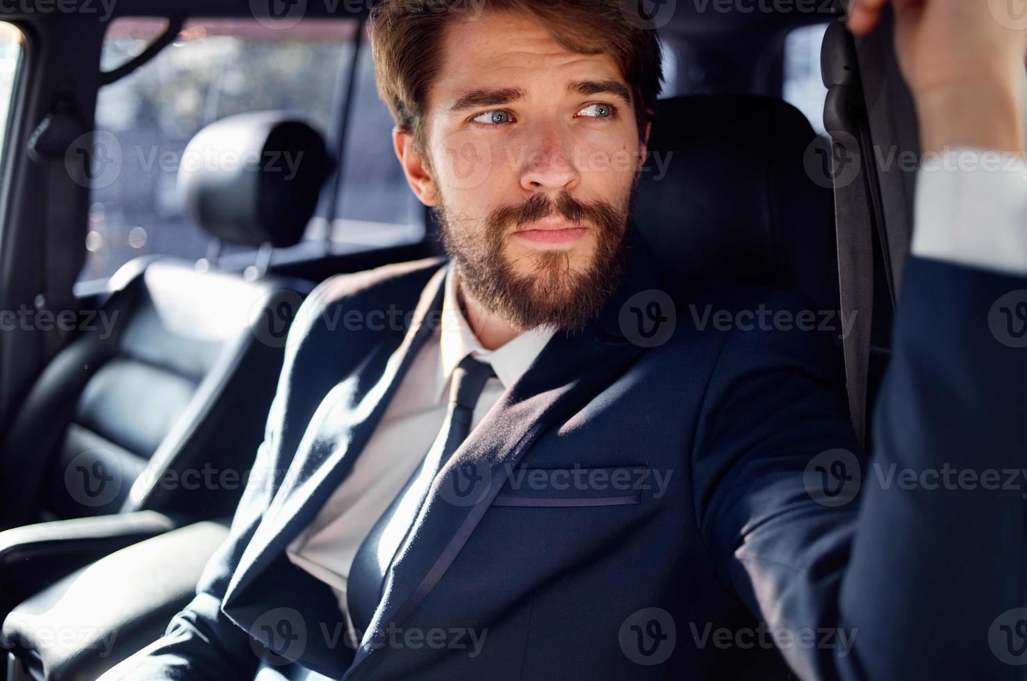 businessmen Driving a car trip luxury lifestyle success service rich photo