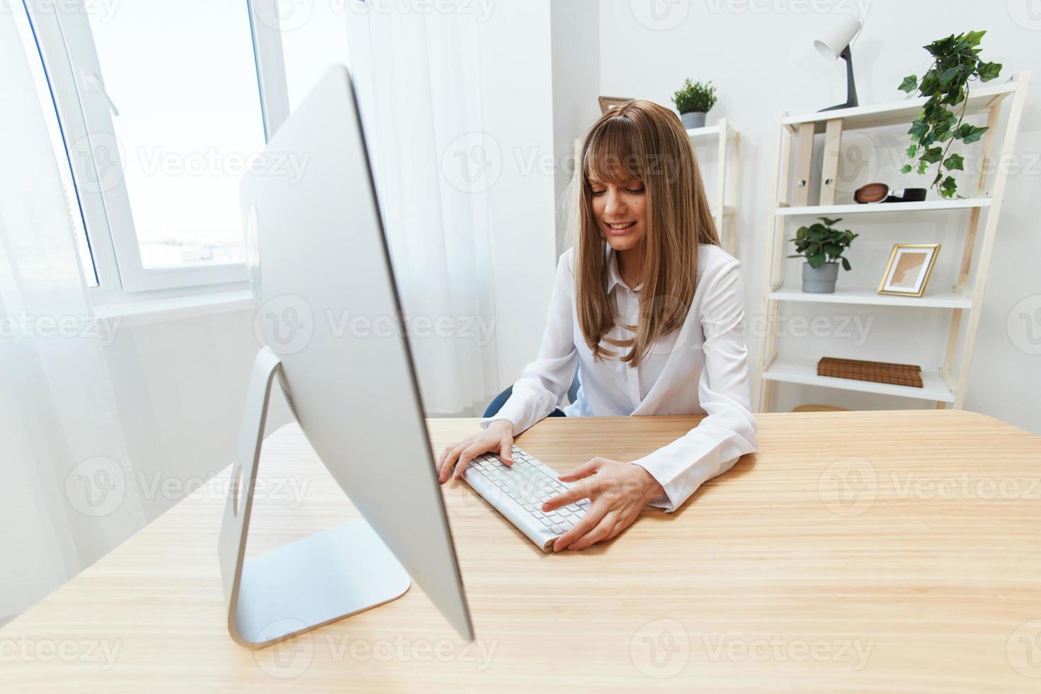 Shocked excited blonde businesswoman touch keyboard confused after computer software crash error at workplace in modern office. Upset director work online in financial corporation. Copy space photo