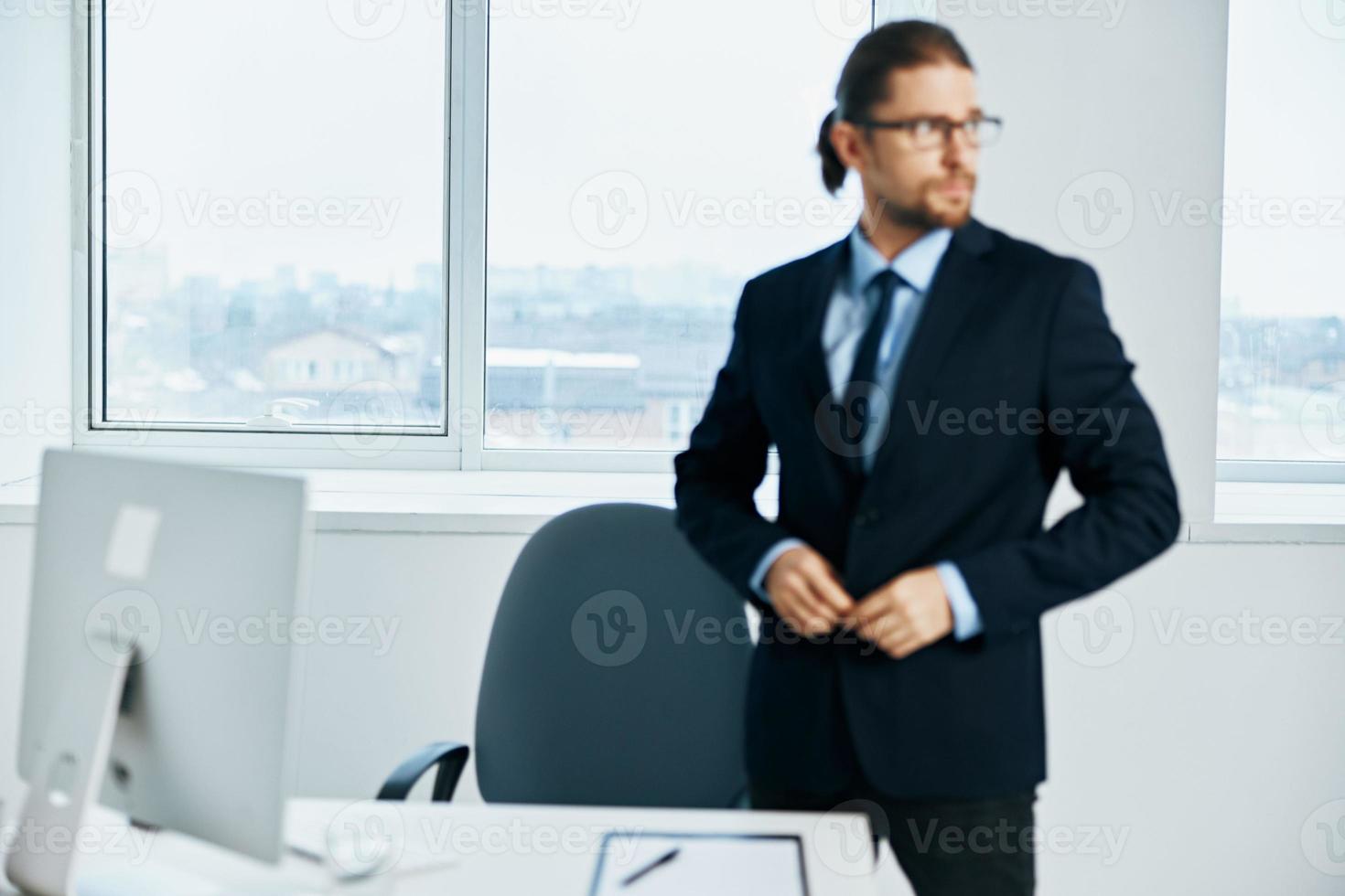 male manager emotions work head documents computer photo