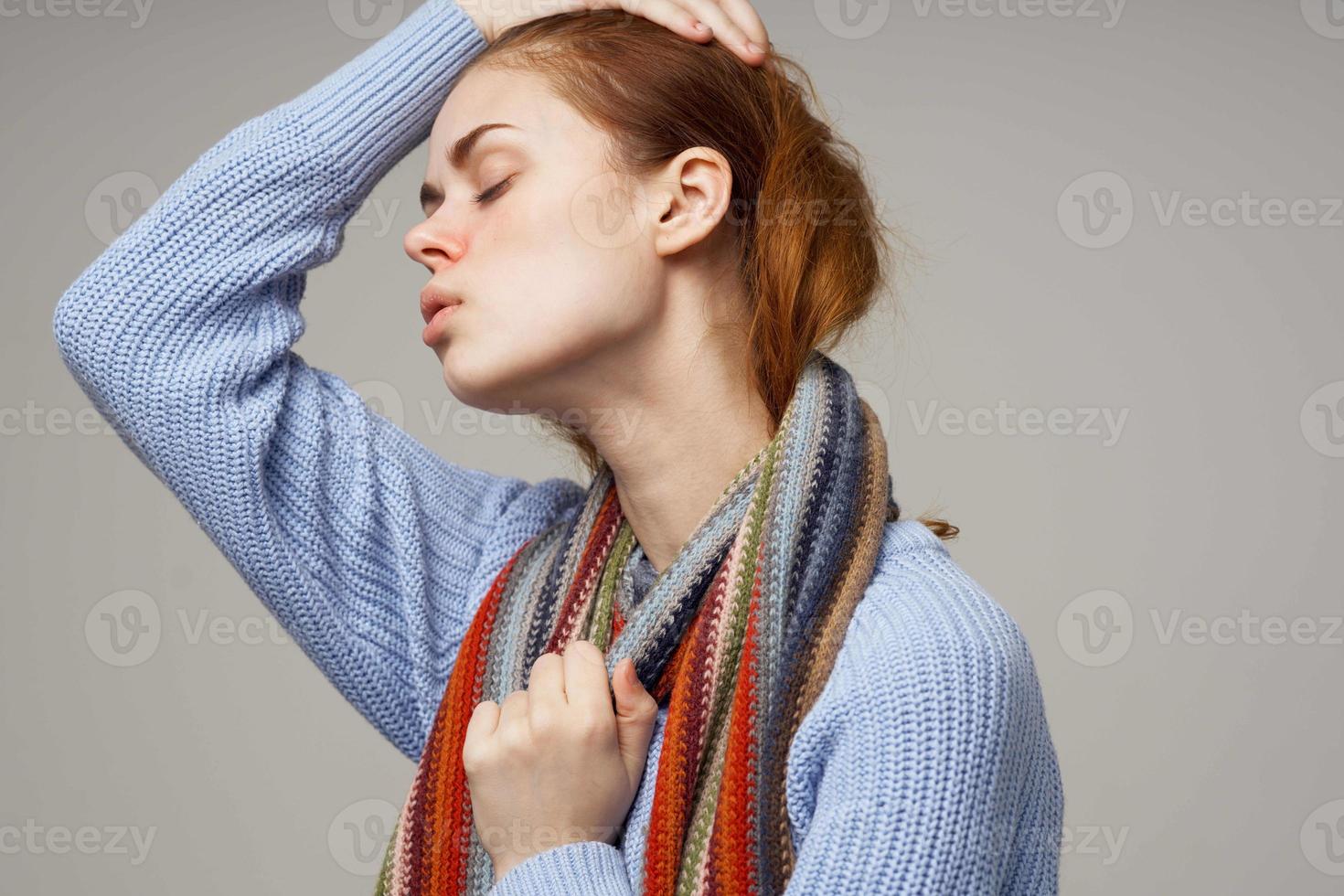 red-haired woman neck scarf cold handkerchief isolated background photo