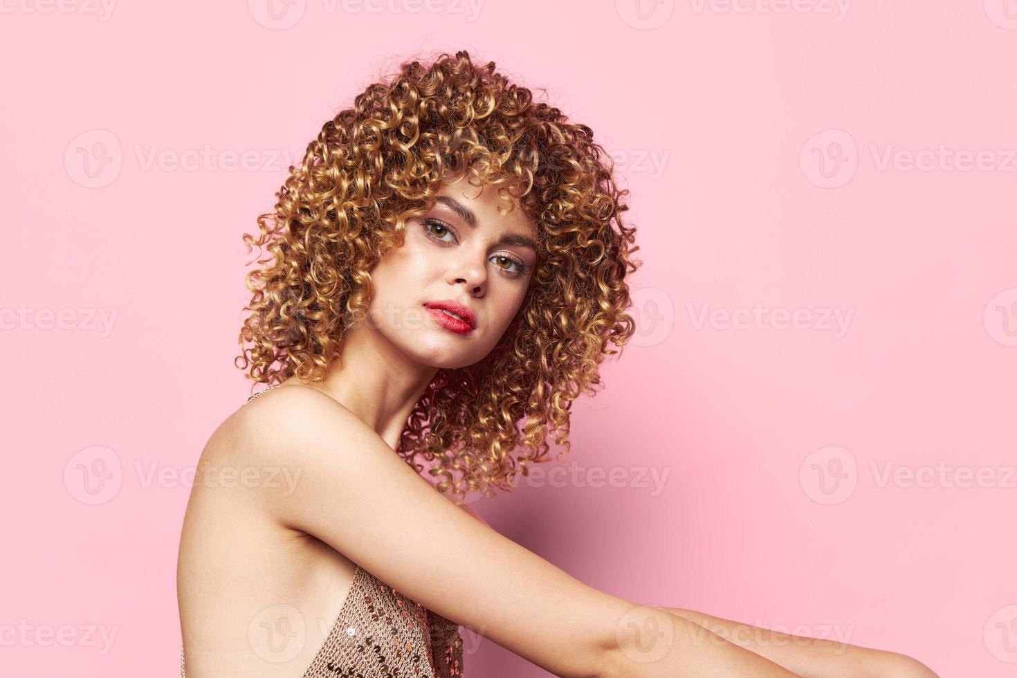 Beautiful woman Curly hair portrait Makeup on the face red lips charm model photo