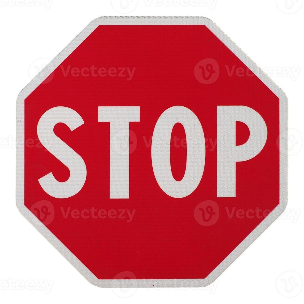 señal de stop aislado sobre blanco foto