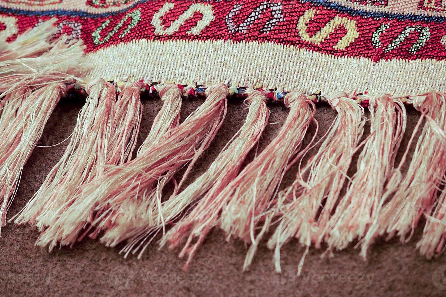 interesting background with handmade Turkish rugs in close-up photo