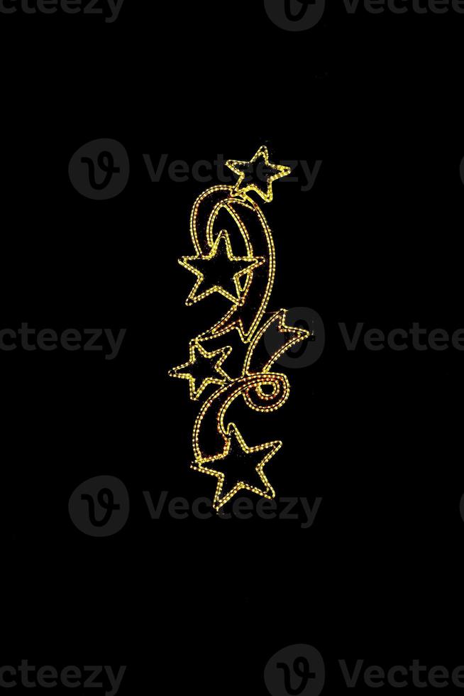 light ornament decorative background on black night background photo