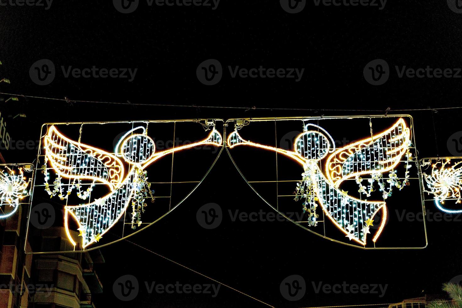 Christmas illuminations in Alicante Spain in the streets at night photo