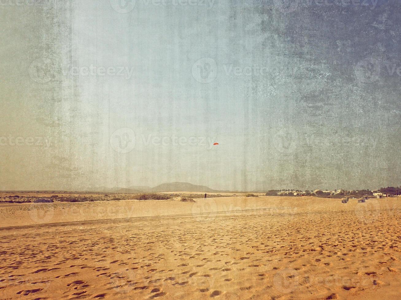 landscape from the Spanish Canary Island Fuerteventura with dunes and the ocean photo