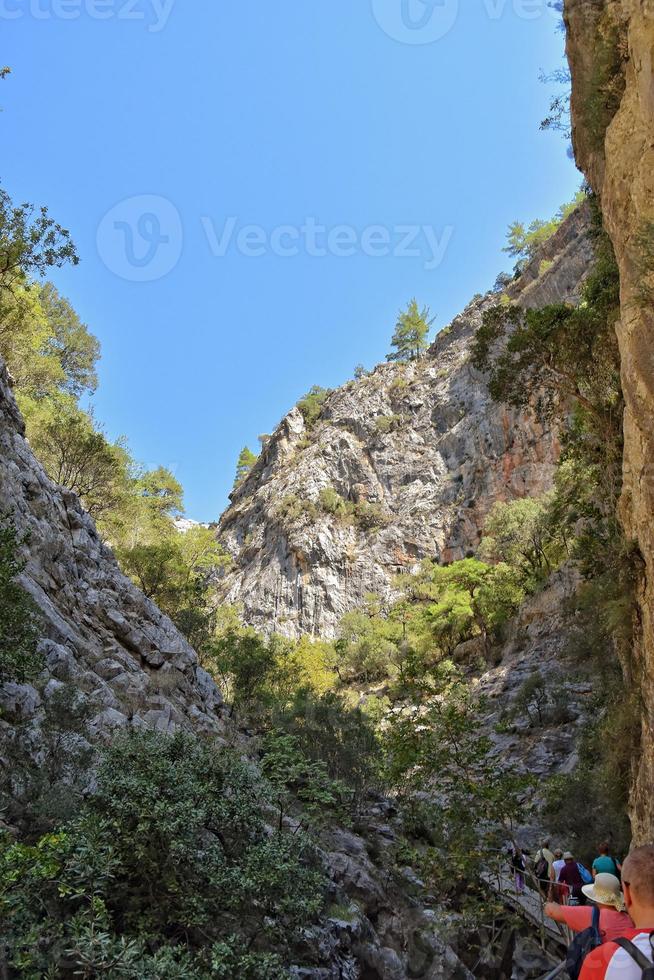 a natural wild landscape in the Turkish mountains with an interesting waterfall and the sapadere canyon photo