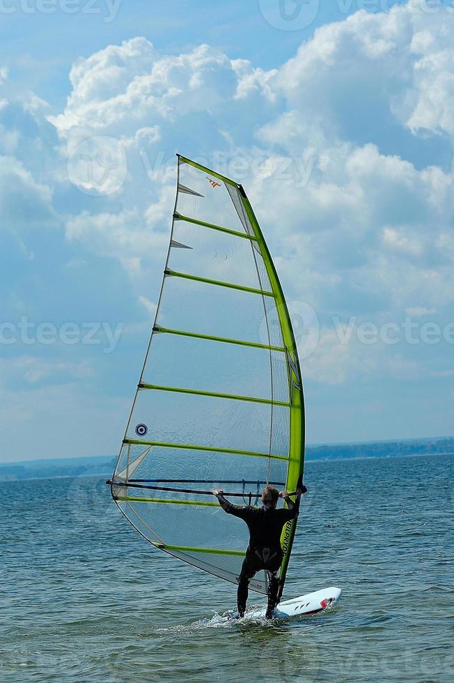 windsurfing on the bay of pucka on the baltic sea photo