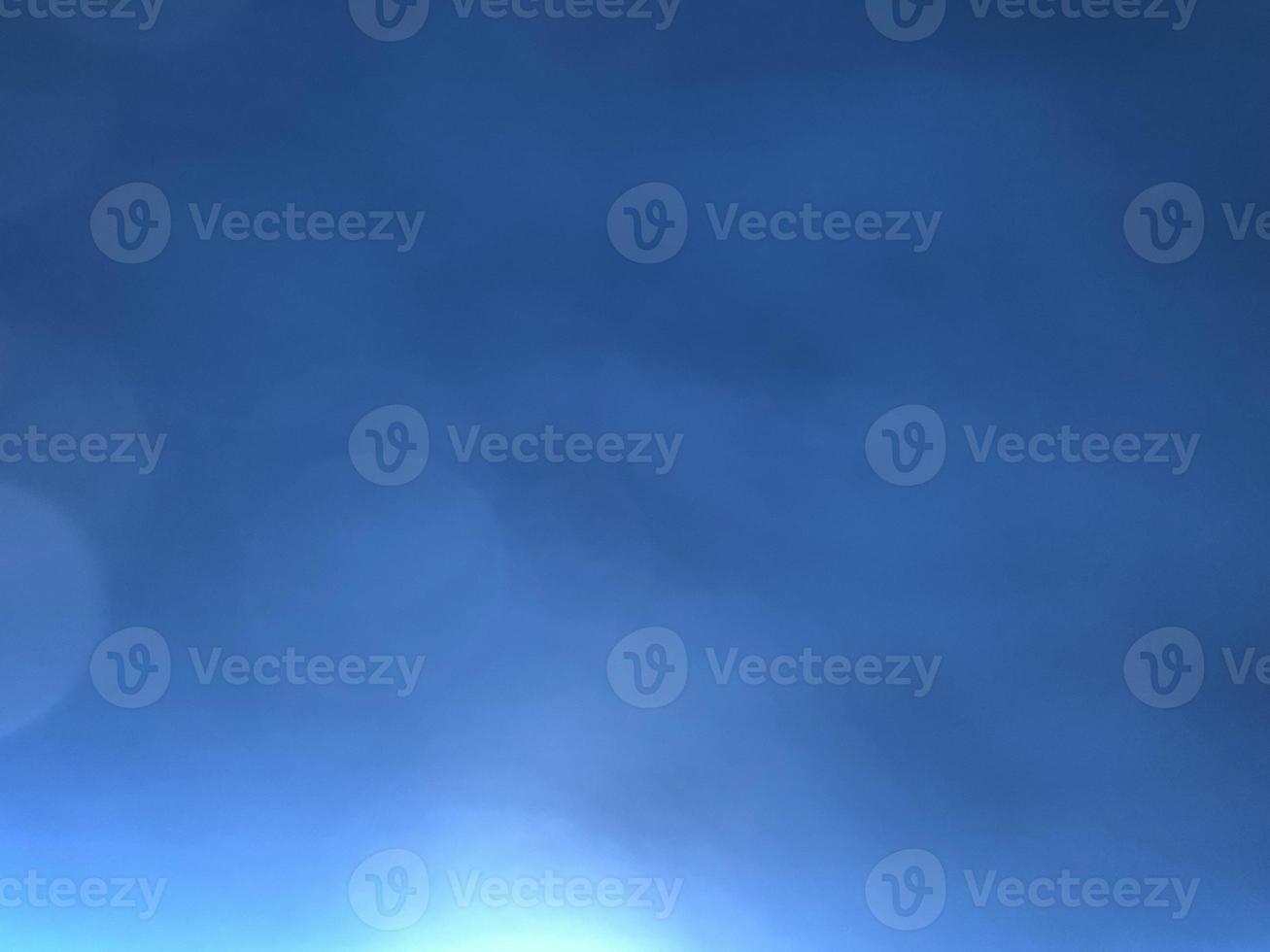 blue abstract blurry background with a lighter bottom photo