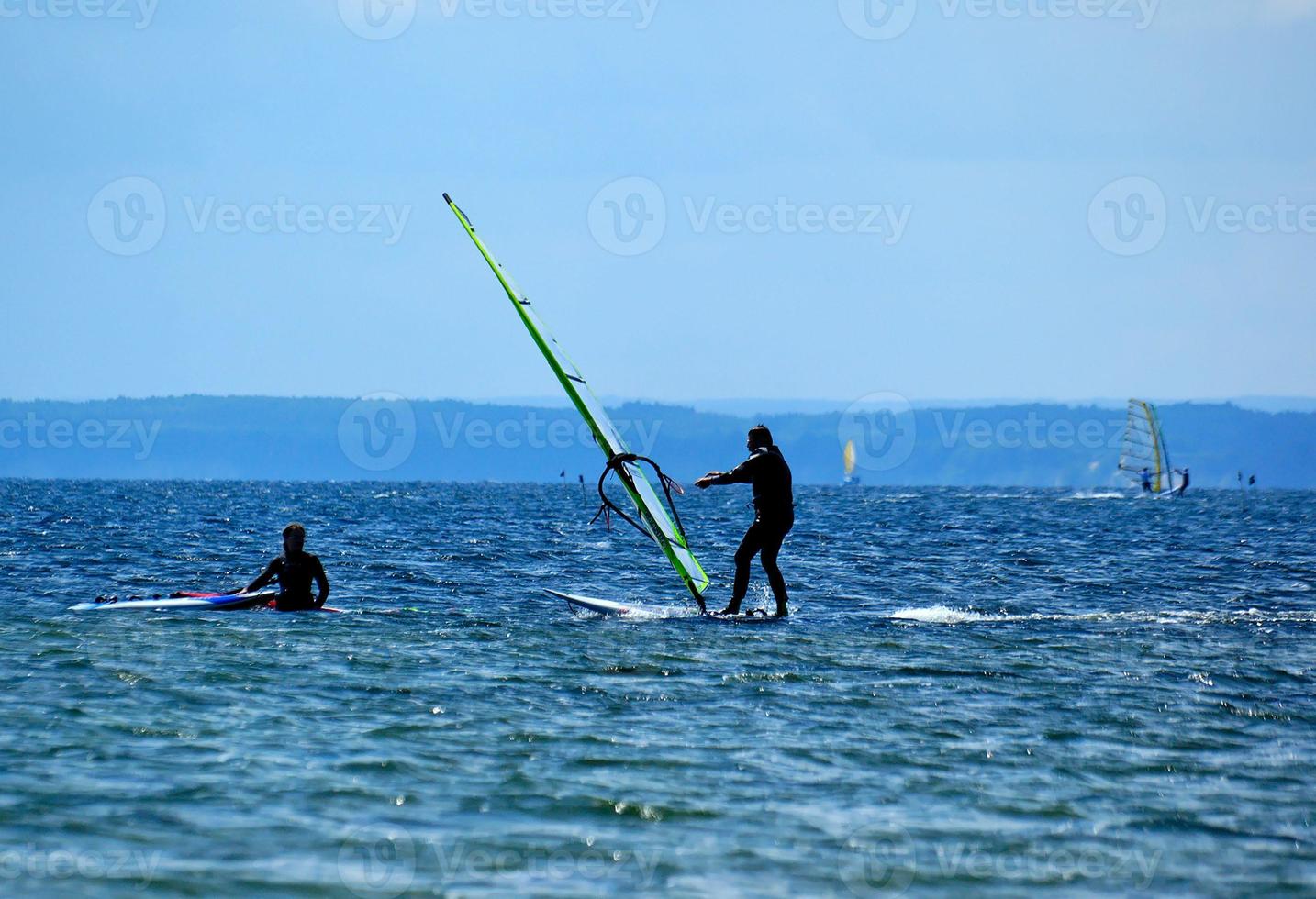 windsurfing on the bay of pucka on the baltic sea photo