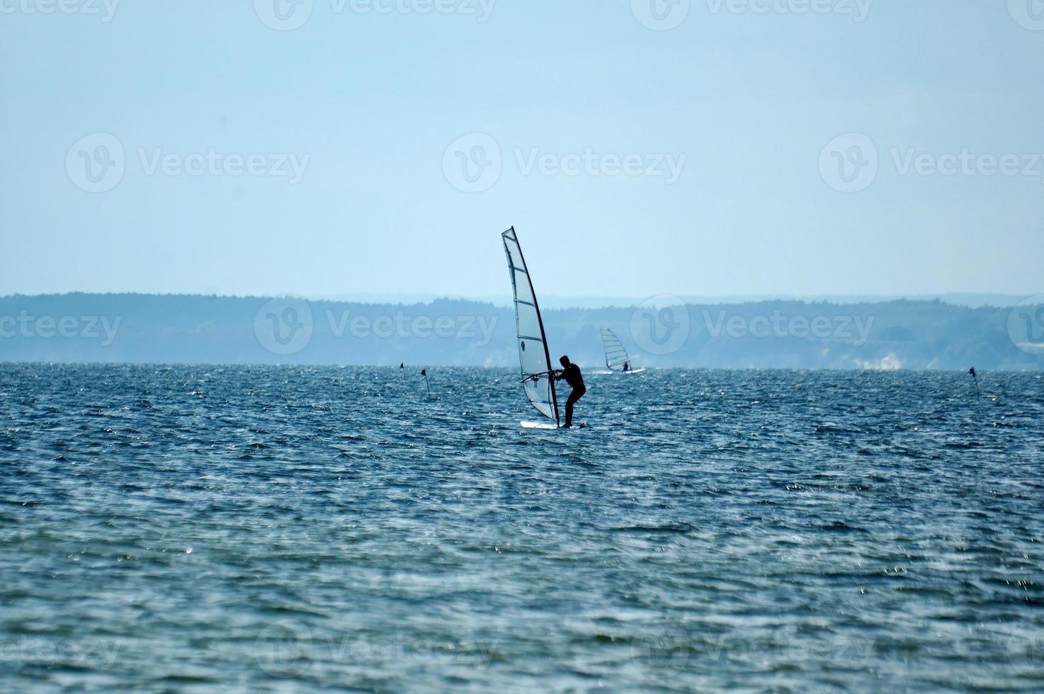 windsurfing on the bay of pucka on the baltic sea photo