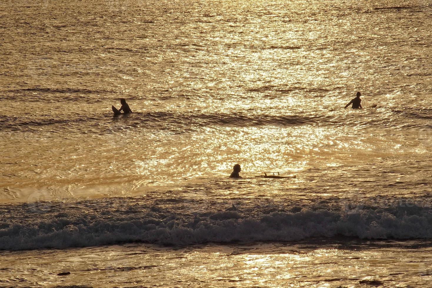 picturesque ocean landscape with the setting sun in a tropical country during summer holidays photo