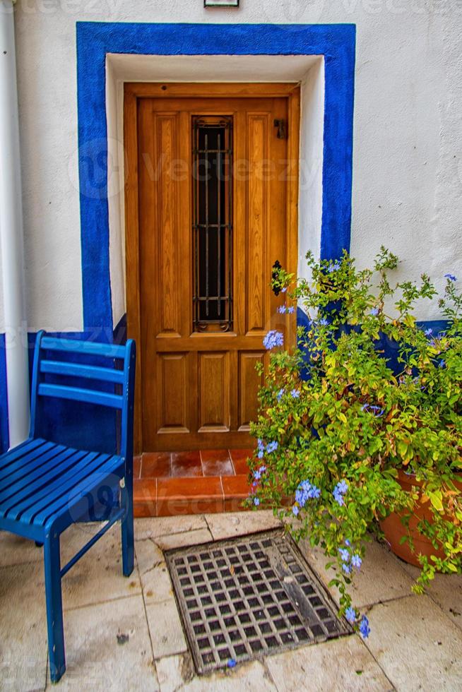 l historic old colorful houses Barrio Santa Cruz Alicante Spain on a sunny day photo