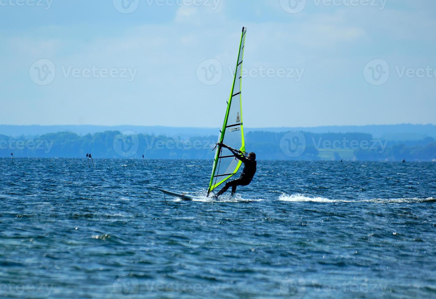 windsurfing on the bay of pucka on the baltic sea photo