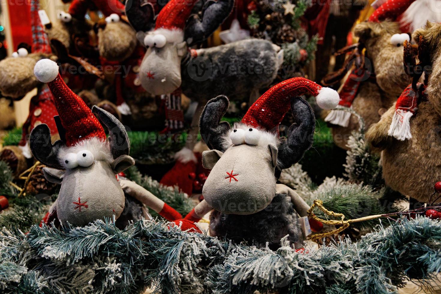 plush christmas elves in red hats background photo