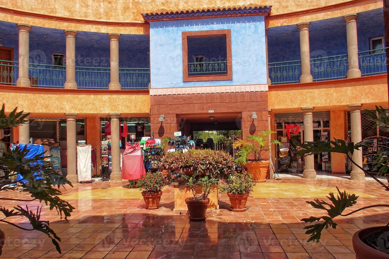 interesting tourist streets in the south of the Canary Island of Tenerife in Spain on a warm summer day photo