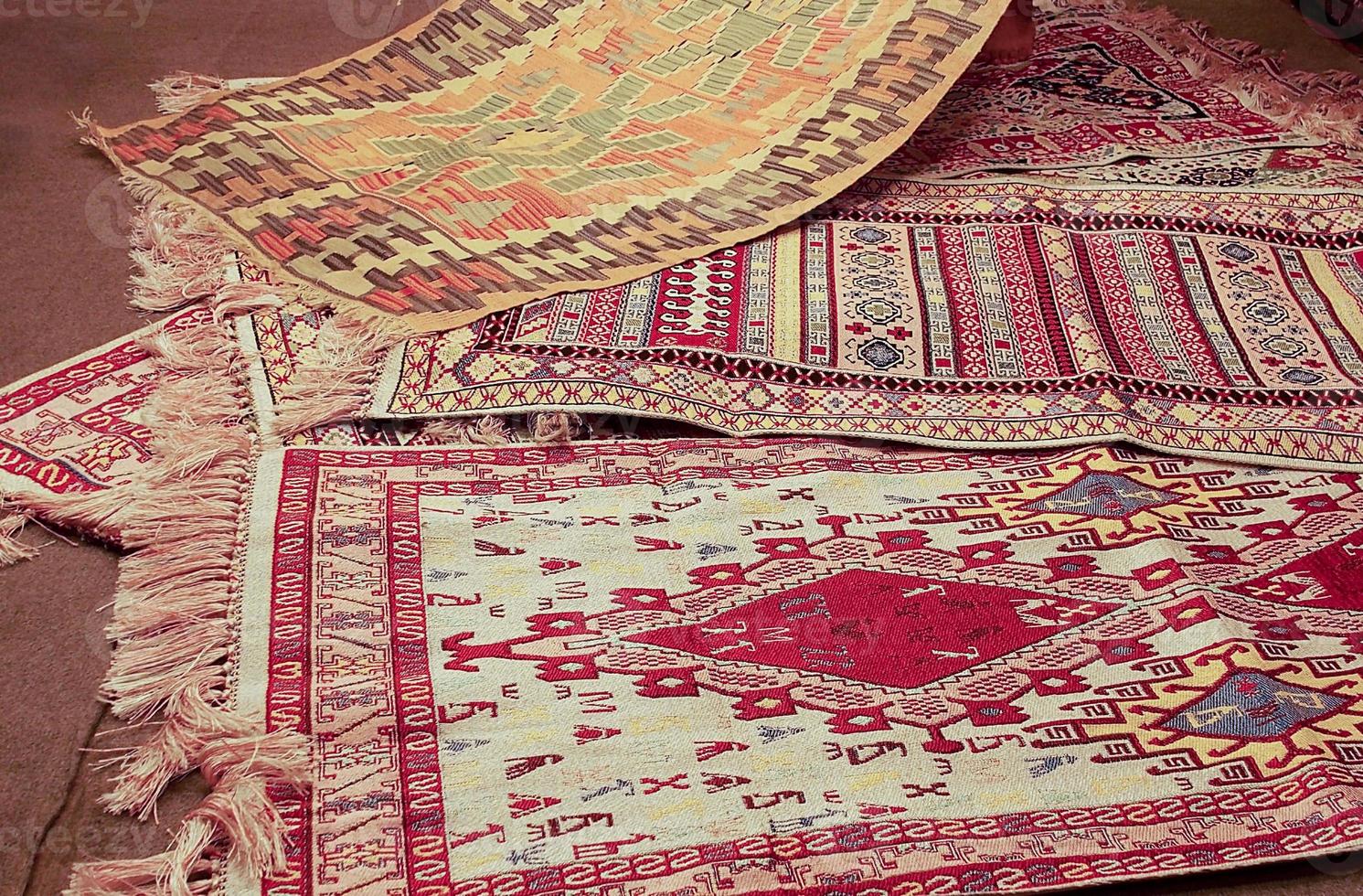 interesting background with handmade Turkish rugs in close-up photo