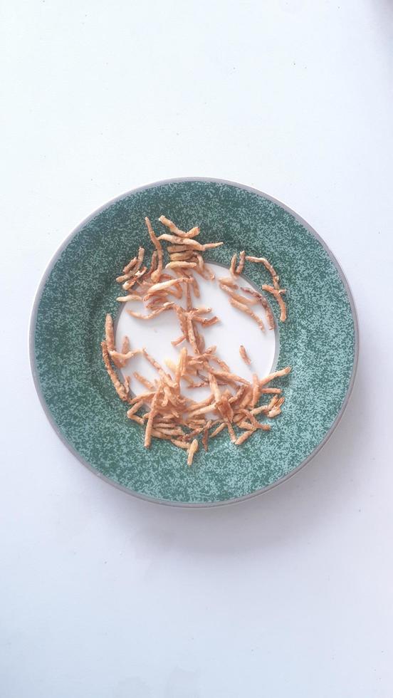 Crispy savory papaya chips photo