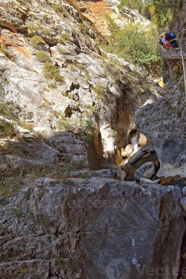 a natural wild landscape in the Turkish mountains with an interesting waterfall and the sapadere canyon photo