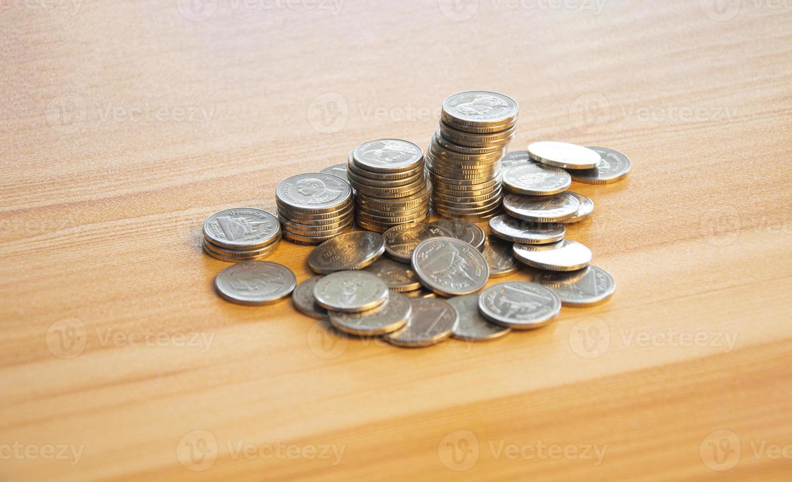 coins stacked in layers From small money growth concept to big business profits. photo