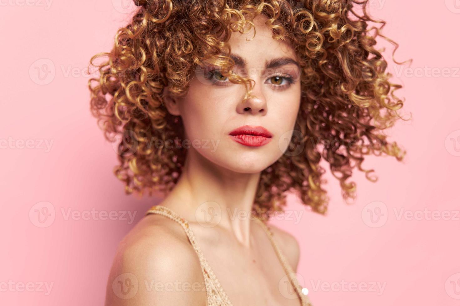 Beautiful woman Close-up curly hair portrait. bright makeup photo