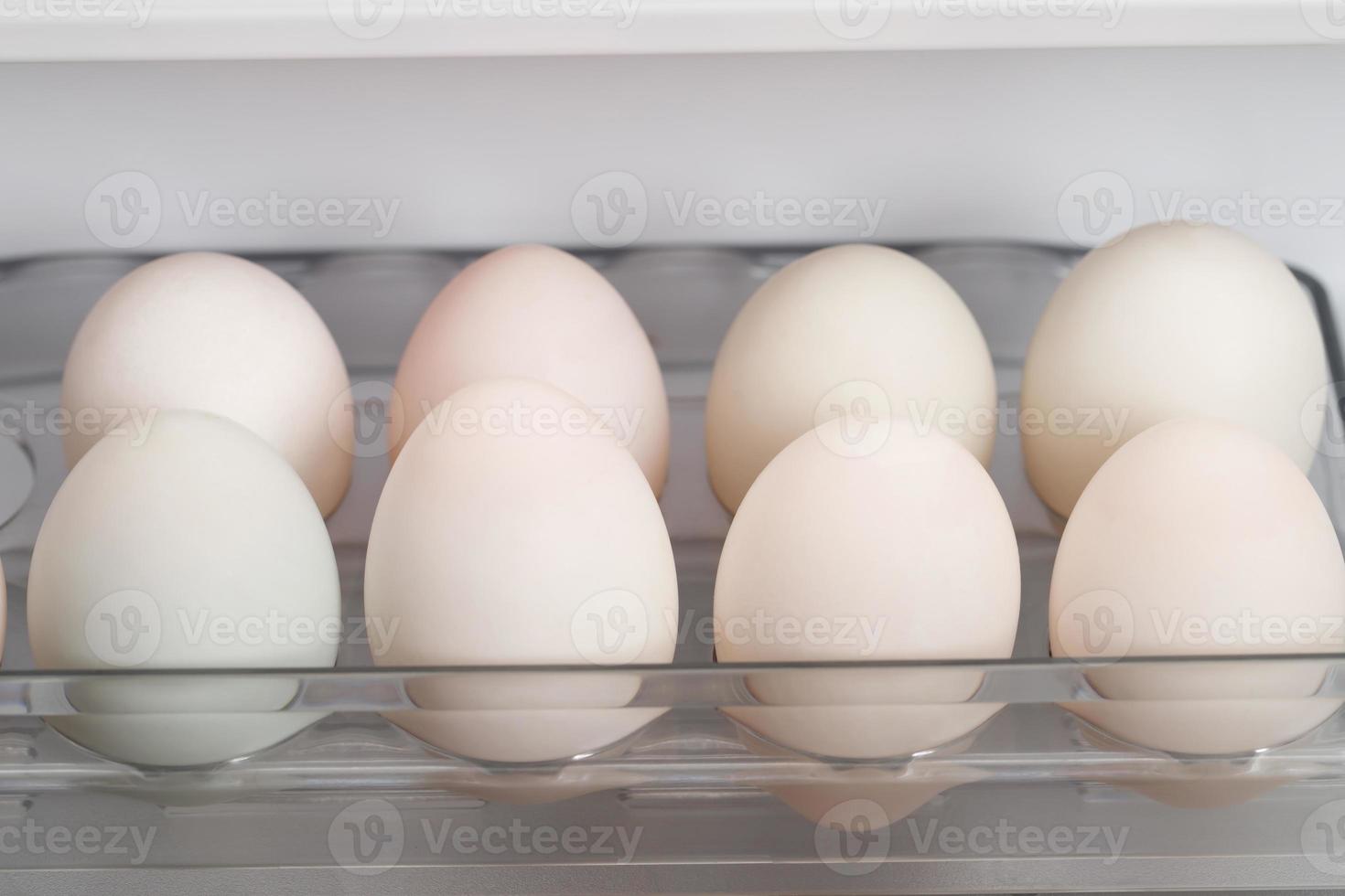 Organic white duck eggs in the fridge fresh from the farm ready for breakfast. photo