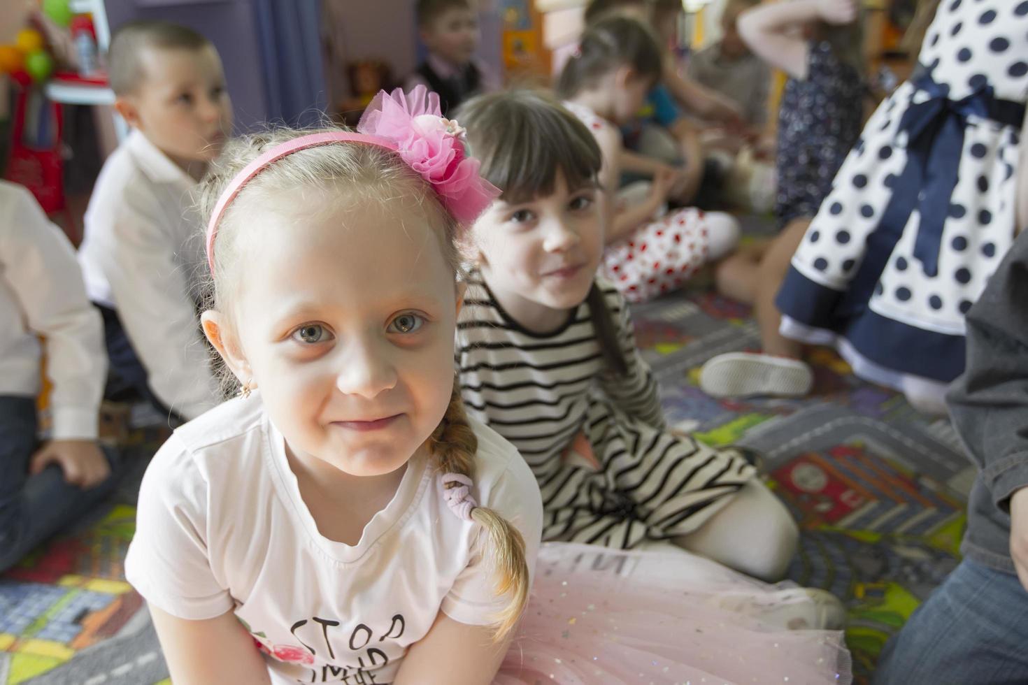 Many children in kindergarten. A group of six year old boys and girls. 22275805 Stock Photo at